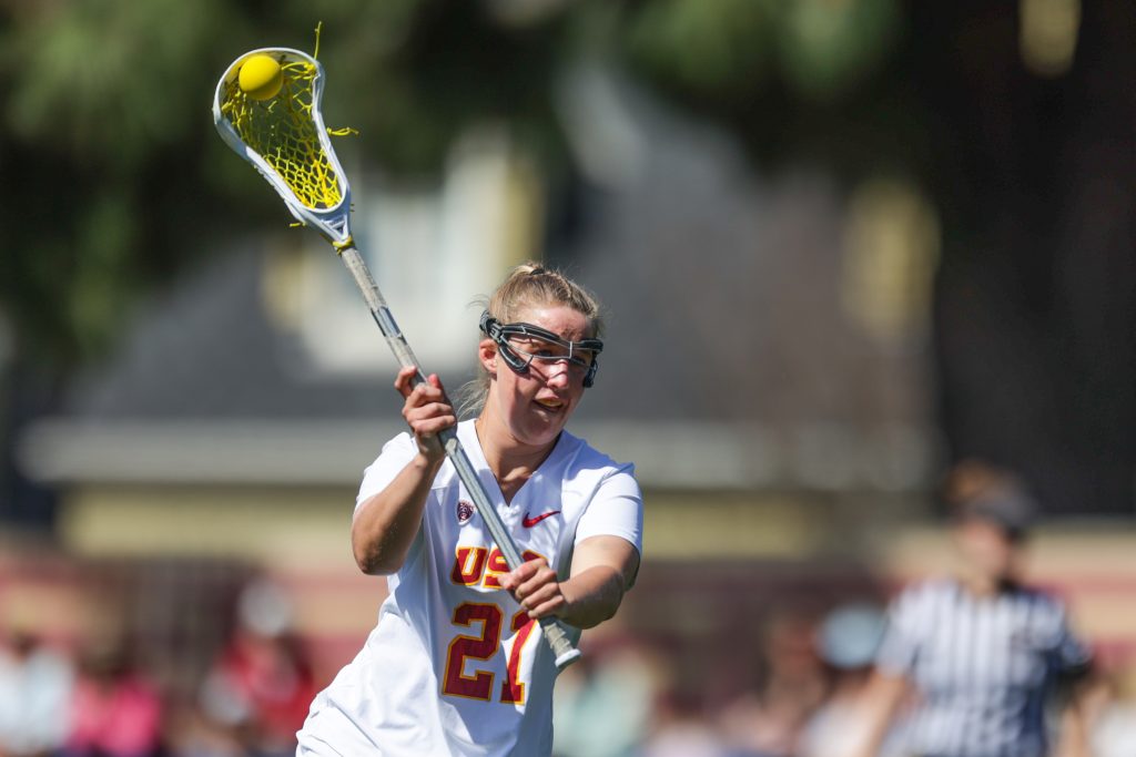 USC women’s lacrosse player Maggie Brown passes the ball during a game.