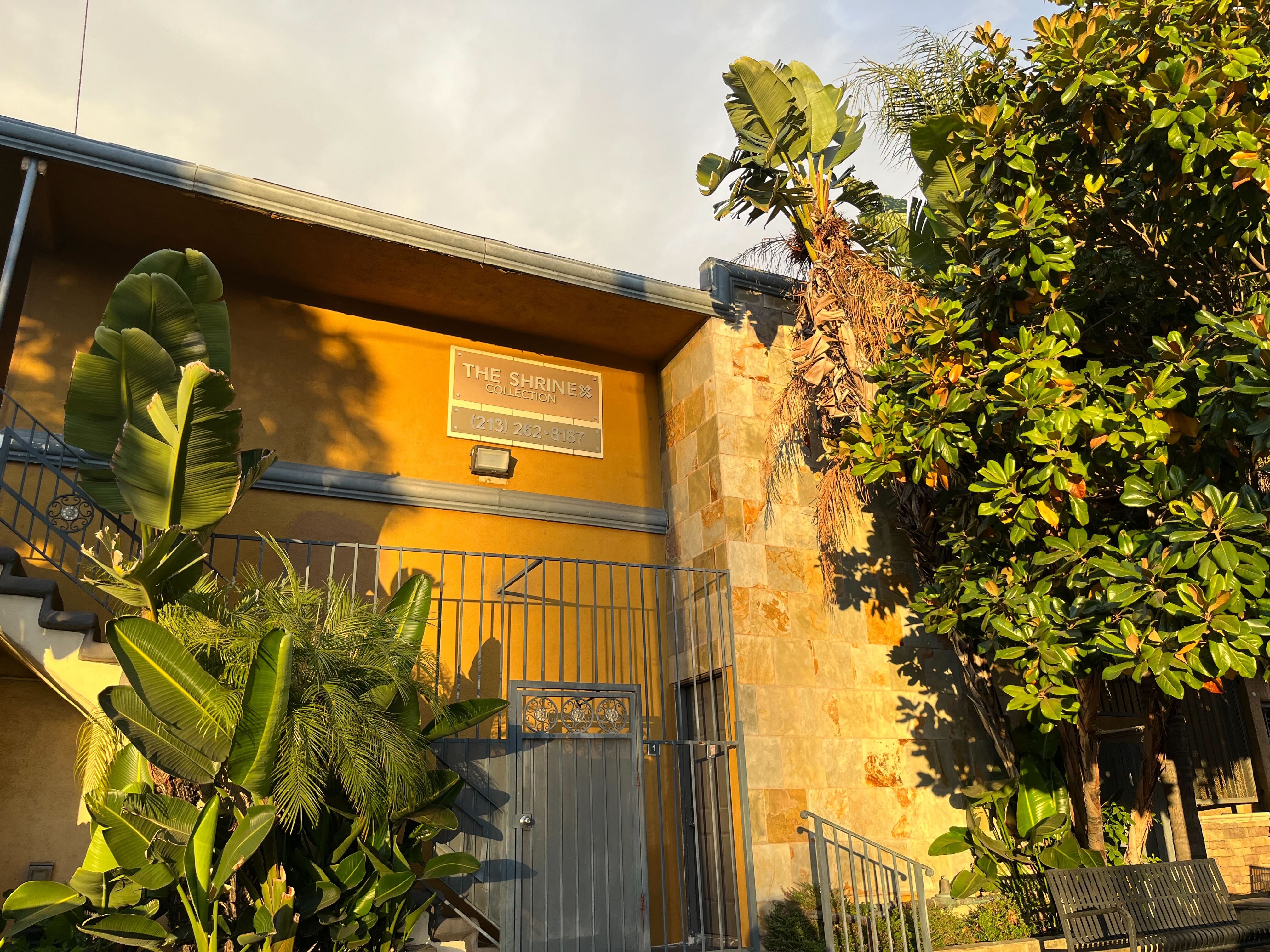 A photo of the exterior of the Corsica apartment building.