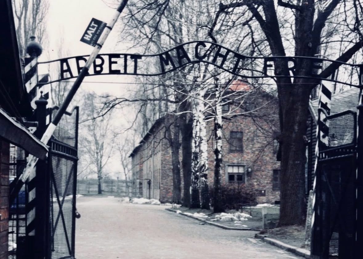 Auschwitz gate reading 'Arbeit Macht Frei'