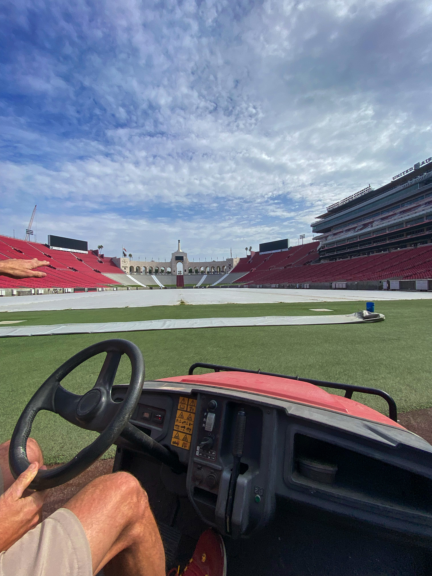 Lupold drives his Toro Workman around the Coliseum after some offseason field work in January. Photo by Jack Smith.